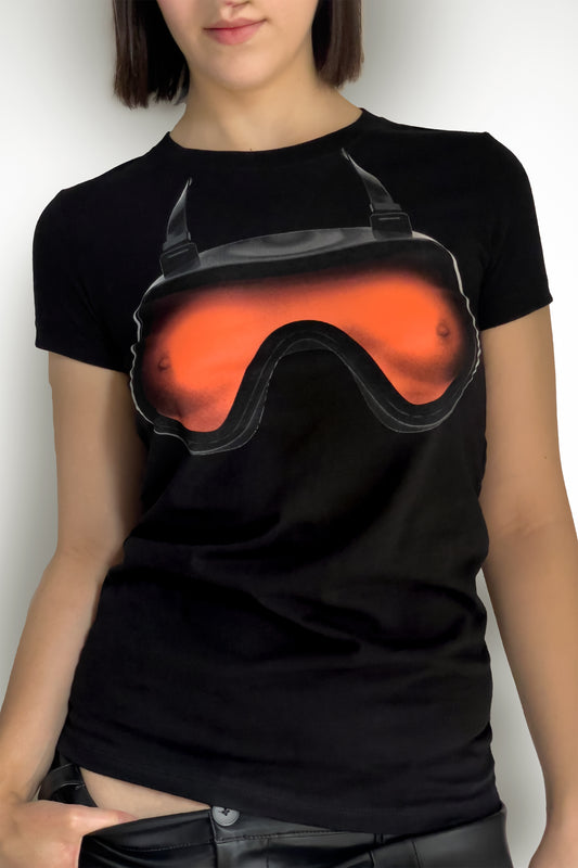 SCUBA BRA T-SHIRT on a model: skin-tight black tee with scuba mask print over the chest, worn with black trousers