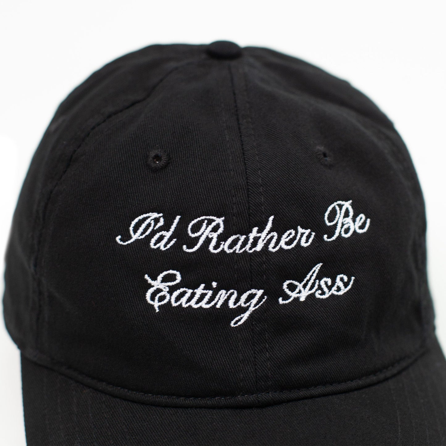 I'D RATHER BE EATING ASS CURSIVE BASEBALL CAP