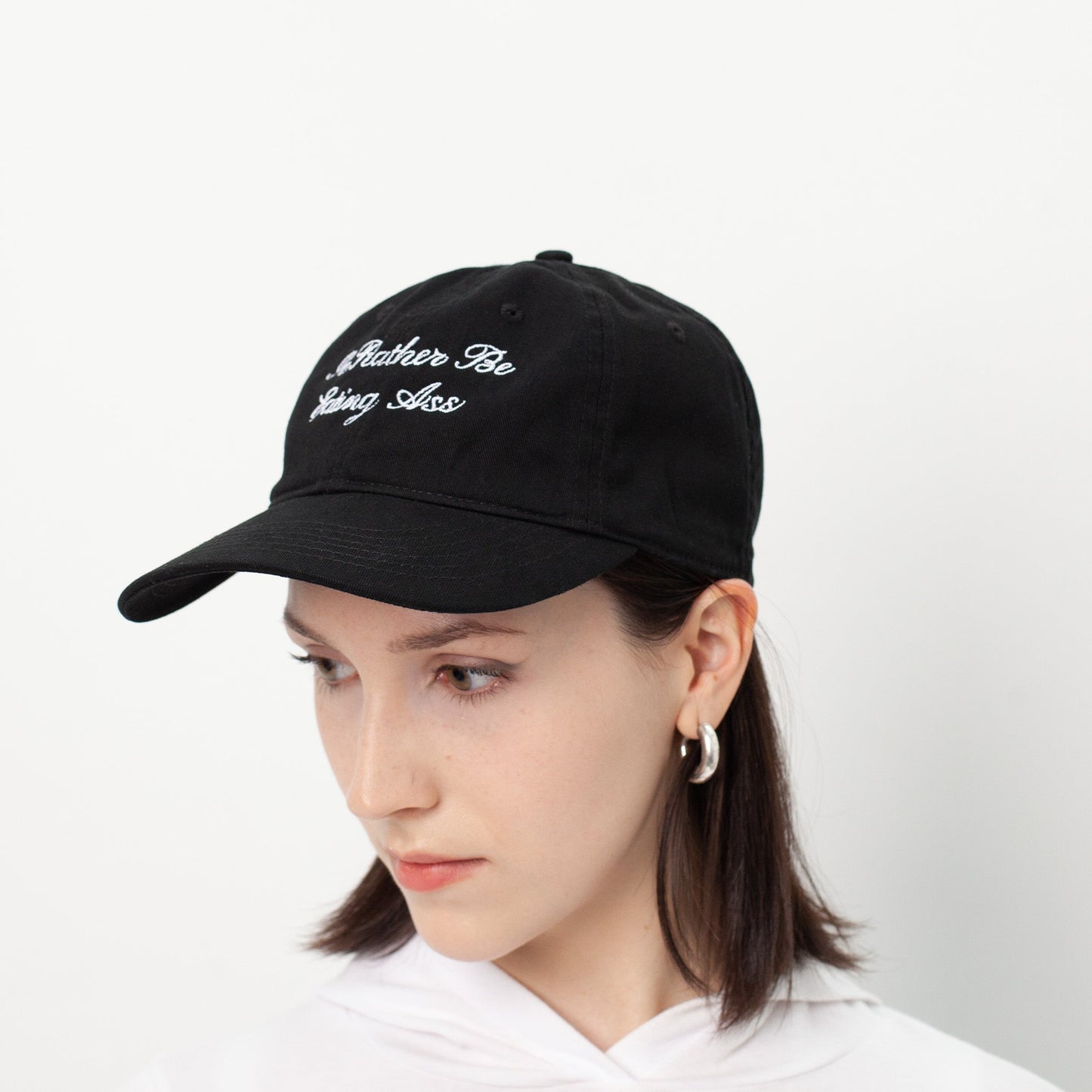 I'D RATHER BE EATING ASS CURSIVE BASEBALL CAP