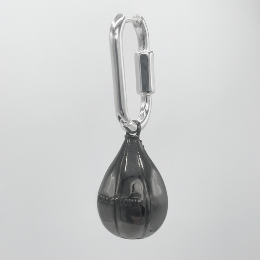 PUNCHING BAG SINGLE EARRING side view: black punching-bag charm with embossed EDNA ST LOUIS lettering, carabiner clasp