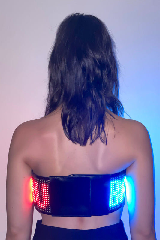 FOOD CART BANDEAU TOP, back view: black back panel with velcro closure, LEDs glowing red and blue at each side