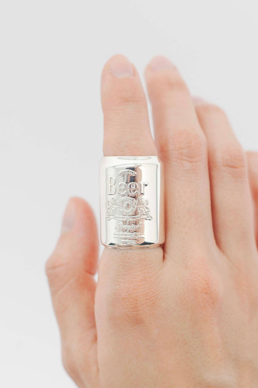 IMPORTED BEER CAN RING on a finger: sterling silver can-shaped ring embossed with "Beer", a crest and "Special"