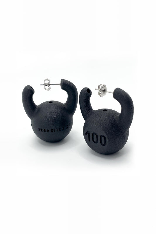 KETTLEBELL EARRINGS from two sides: one shows "100", the other the "EDNA ST LOUIS" lettering on its back