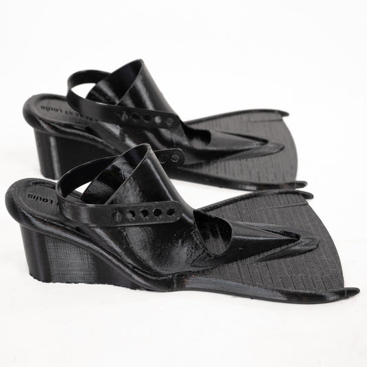 SCUBA HEELS, pair side by side on white: black 3D-printed flipper heels with wedge, fin sole and heel strap