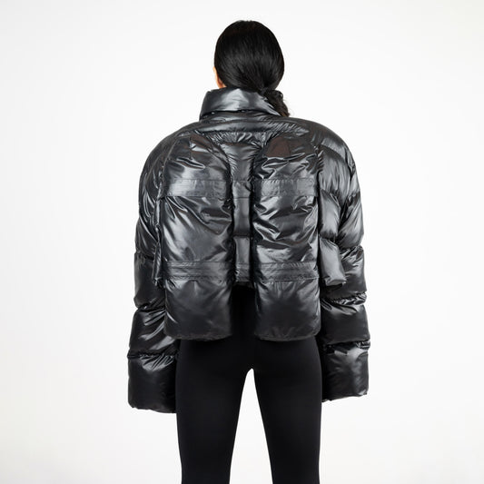 SCUBA PUFFER JACKET, back view at full length: tank-detail panels, oversized sleeves and cropped hem over black leggings