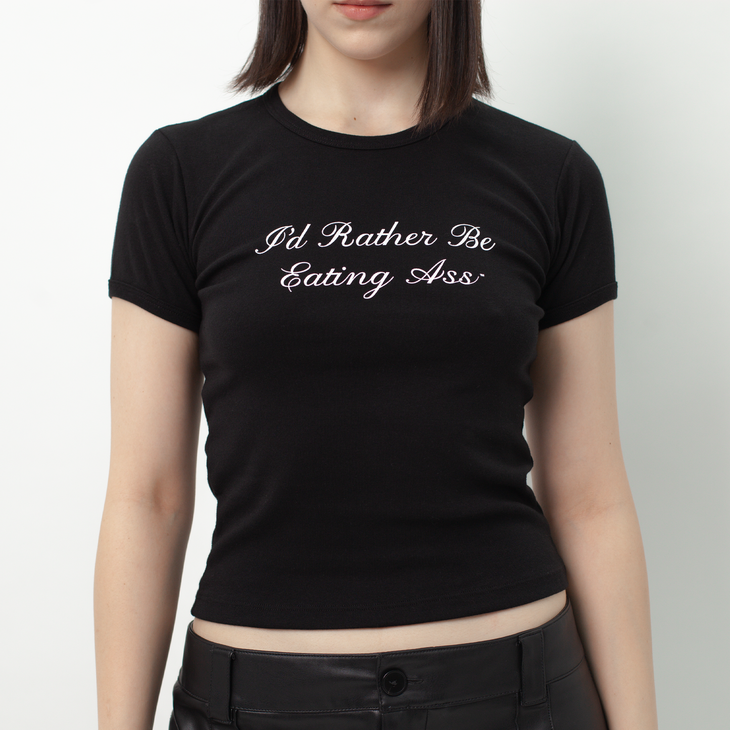 I'D RATHER BE EATING ASS CURSIVE BABY TEE